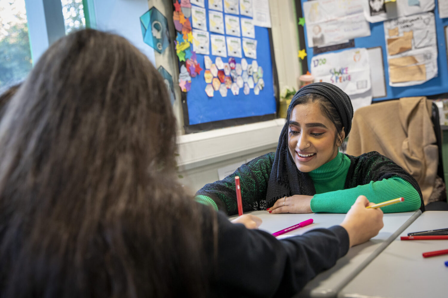 School children working on a poster campaign about Britishness in their form group. Secondary education in progress at Matthew Moss High School, Rochdale, United Kingdom on the 21st of October 2021. (photo by Andy Aitchison)